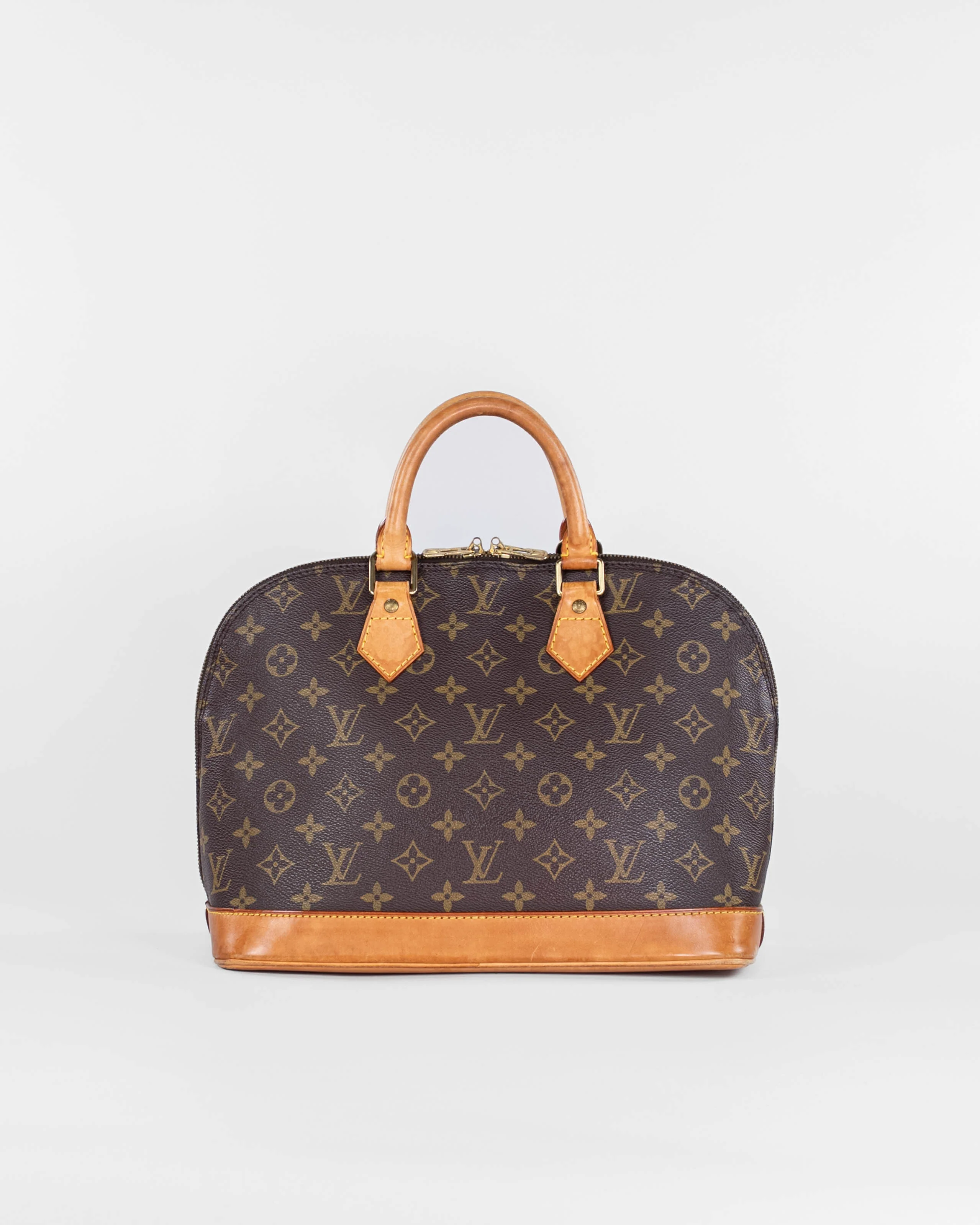 Monogram Alma Hand Bag