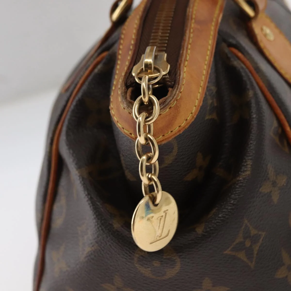 Monogram Tivoli PM Hand Bag - Image 16